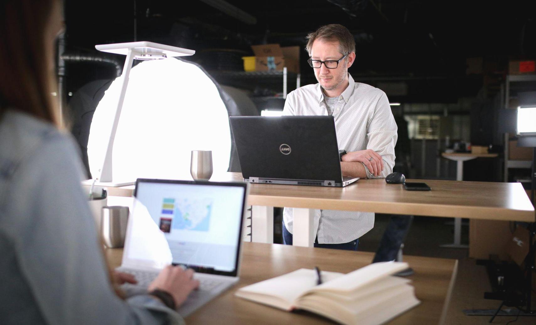 Professional stock market analysis workspace showing trading charts and financial data